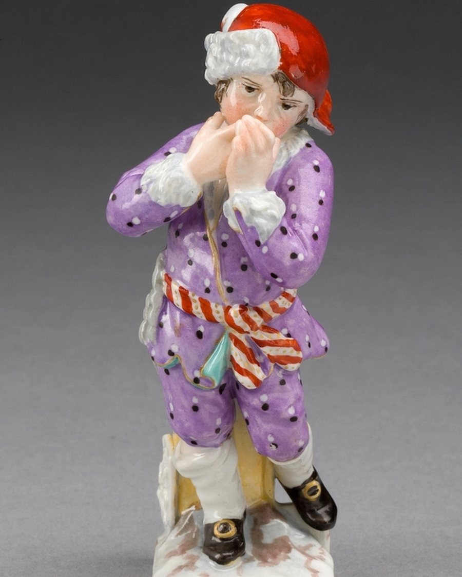 Porcelain Figure in Purple Coat