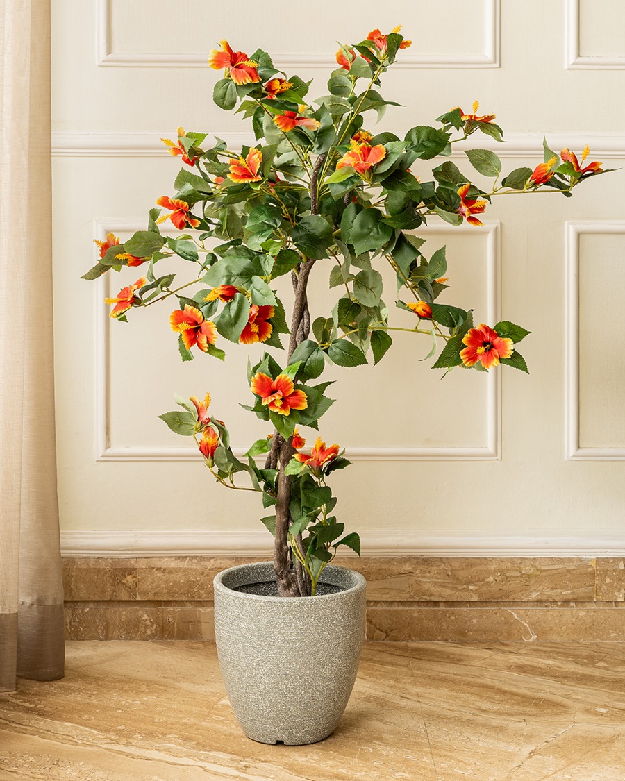 Faux Flowering Tree in Stone Pot
